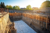 Fondation mur de soutènement 2m : Solutions & Règles d&rsquo;or